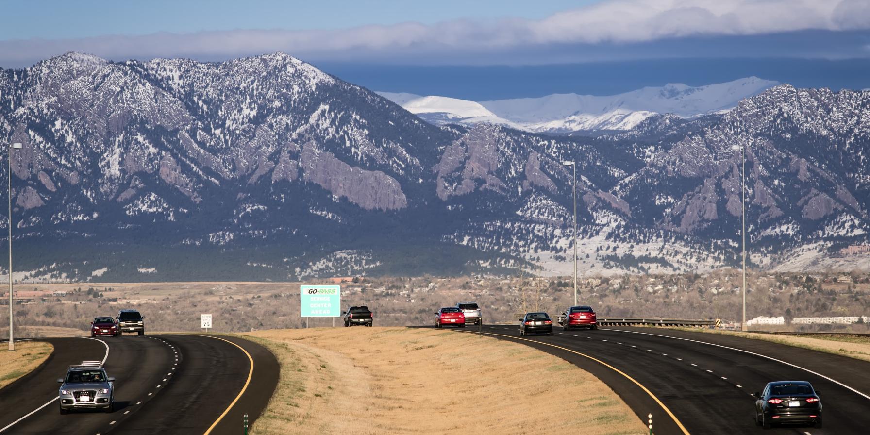 Northwest Parkway with mountains in background