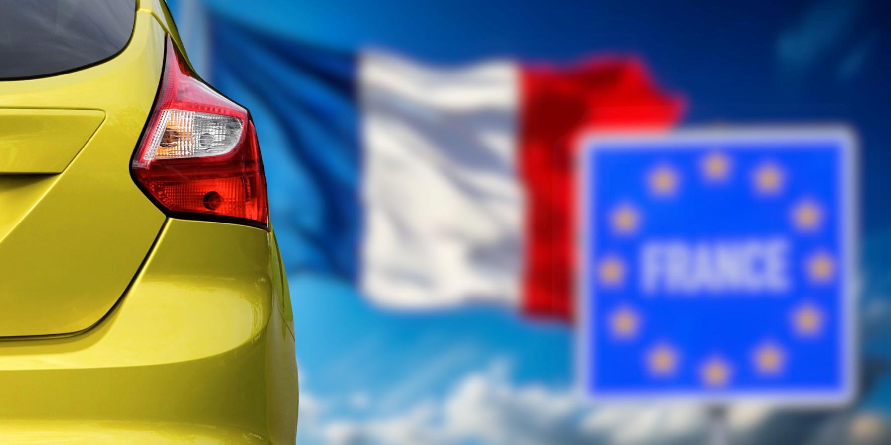 modern car with French flag in sight