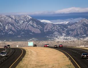 Northwest Parkway with mountains in background