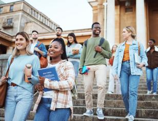 Students walking together down a stairway